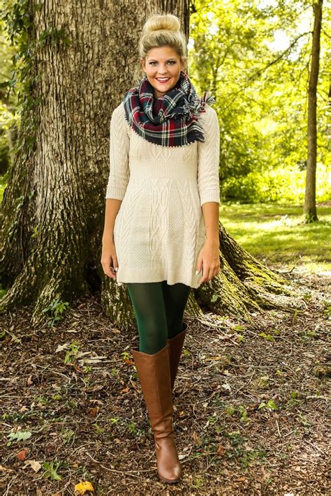 Ivory Cabled Sweater Dress Plaid Blanket Scarf Hunter Green Tights Brown Riding Boots