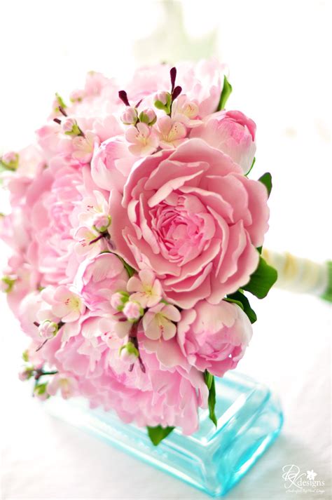 The peony or paeony is a flowering plant in the genus paeonia, the only genus in the family paeoniaceae. DK Designs: Pink Peony and Cherry Blossom Bouquet