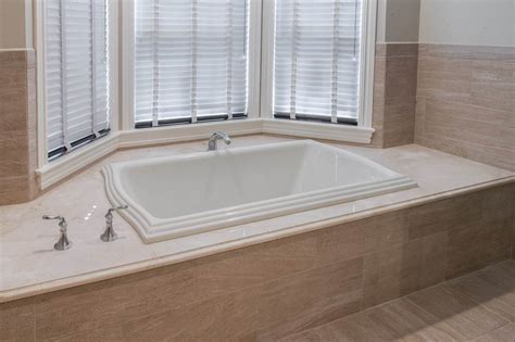 Here Is Why Natural Stone Is Great For A Bathtub Surround