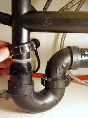 Start by connecting the drainpipe to the discharge pump. How to Remove & Fix a Kitchen Sink Drain - Mobile Home Repair