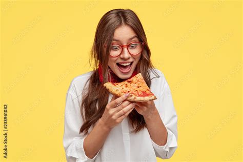 Hungry Student Opens Mouth Widely While Sees Delicious Slice Of Pizza
