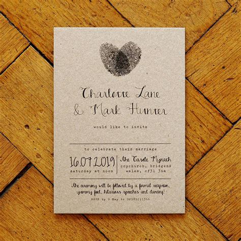 Luxury clutch bag style for invitation cards feature: Unique Wedding Invitations That Will Really Stand Out! | CHWV