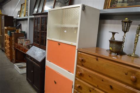 Today, they insist on planning their own bathrooms as they do the other rooms in the home. A 1960's kitchen cabinet