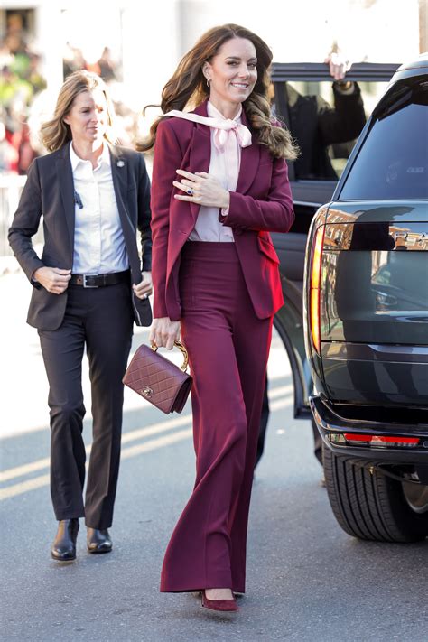 Kate Middleton Chose A Slim Cut Burgundy Suit From This Designer For