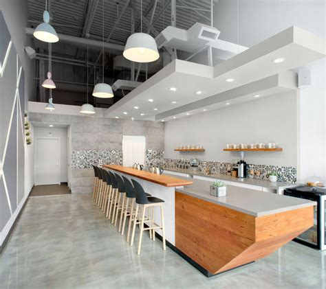 This Modern Coffee Shop Has A Palette Of Grey White And Wood