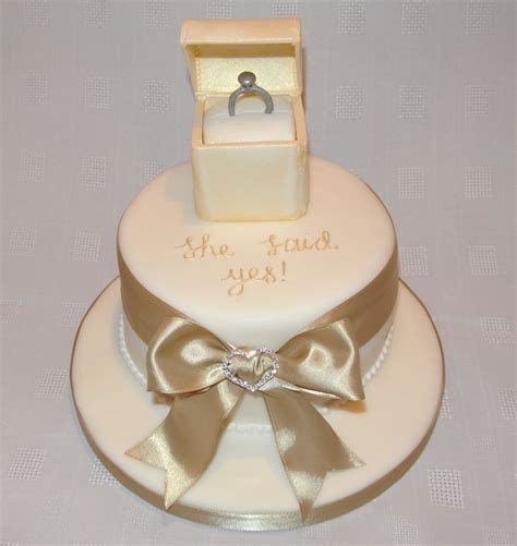Top 10 cute engagement cake ideas that are easy to make. "She said yes" engagement cake use the lighted ring box ...
