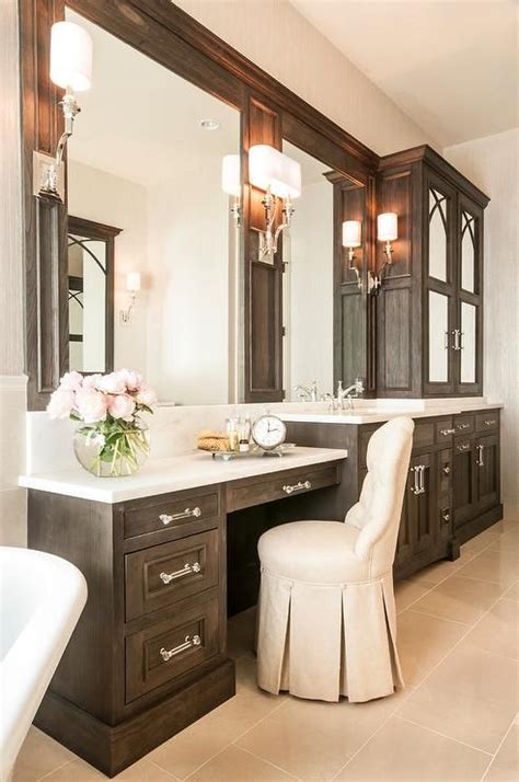 These are the very best bathroom color ideas. Elegant bathroom features dark brown vanity cabinets ...