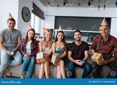 Participants In The Birthday Party Make A Group Photo They Are Sitting