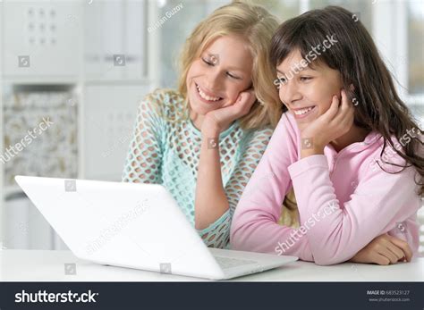 Two Girls Using Laptop Stock Photo Edit Now 683523127