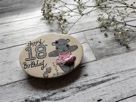 Create customized jewelry that reflects the style she has built through the years, and pair it with a box of gourmet sweets and a fresh birthday bouquet for a little pampering. 18th birthday gift for her, happy 18th keepsake pebble ...