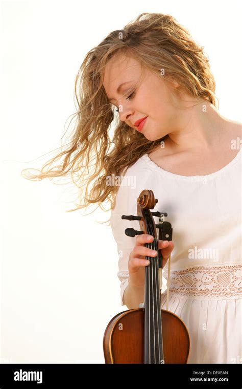 Portrait Of Blonde Girl Music Lover On Beach With A Violin Love Of