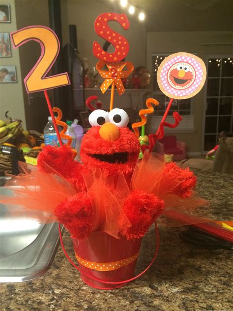 The Birthday Cake Is Made To Look Like Elmo From Sesames Big Bird