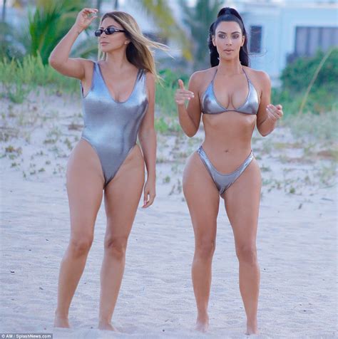 kim kardashian wears sexy silver suit as she poses away in miami daily mail online
