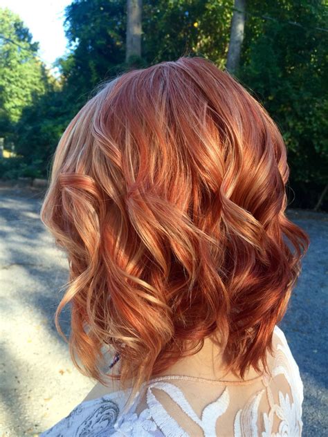 copper red hair color with blonde highlights