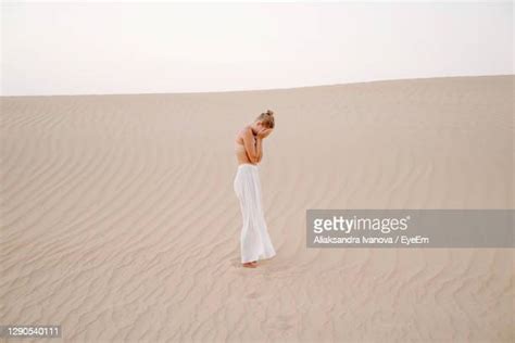 Head Sand Woman Photos And Premium High Res Pictures Getty Images