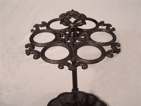 The design brings elegance to homes and living. 8413 Victorian cast iron cane and umbrella stand c1870 For ...