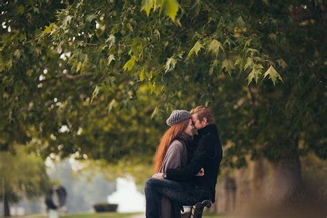 Red Haired Couple Kissing By Stocksy Contributor Lumina Stocksy