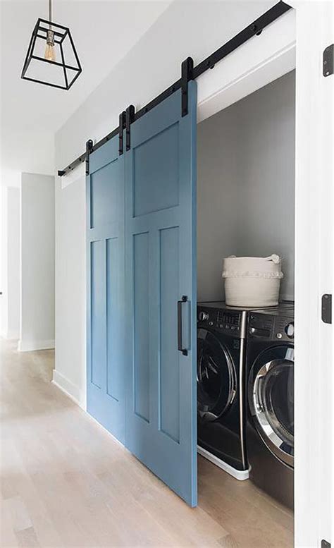 Hidden Small Laundry Room With Sliding Barn Door Homemydesign