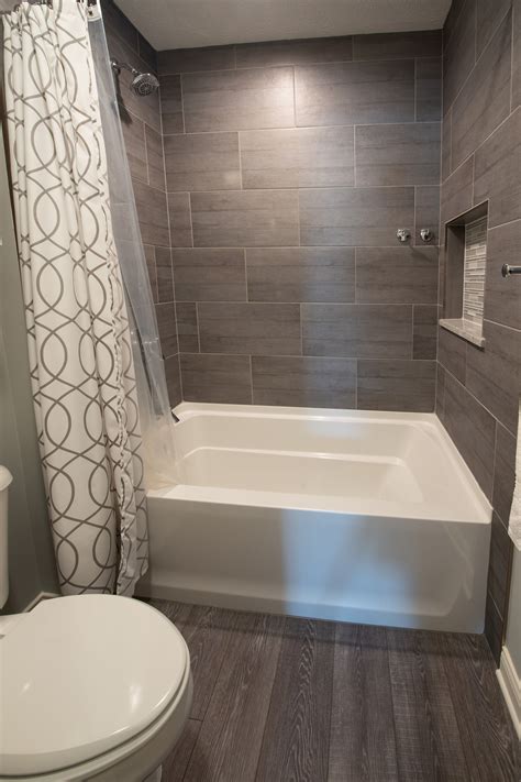 Guest Bathroom Remodel In Indiana Wood Floors Subway Tile Wall In Tub
