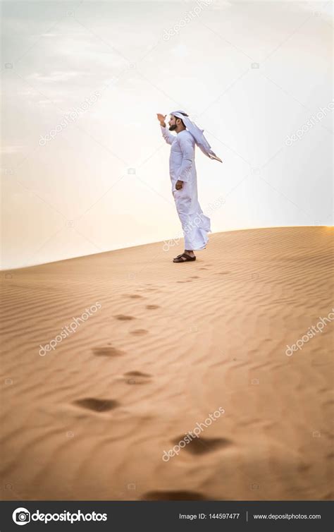 Arabian Man In Desert — Stock Photo © Oneinchpunch 144597477
