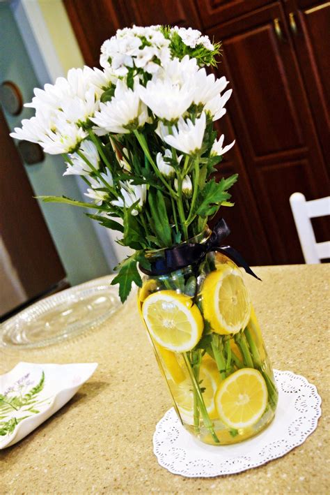 Lemon And Daisy Mason Jar Centerpieces With Lace Doily Accents For A