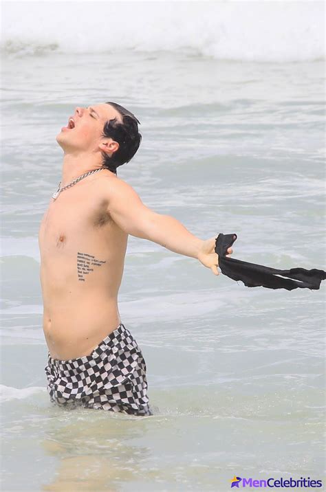 Yungblud Flaunts His Bare Chest On The Beach And May Be Celebrating Her
