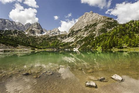 Scenic Turquoise Lake Seebensee With Reflections Surrounded By A