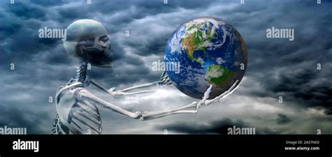 Skeleton Holding Earth Stock Photo Alamy