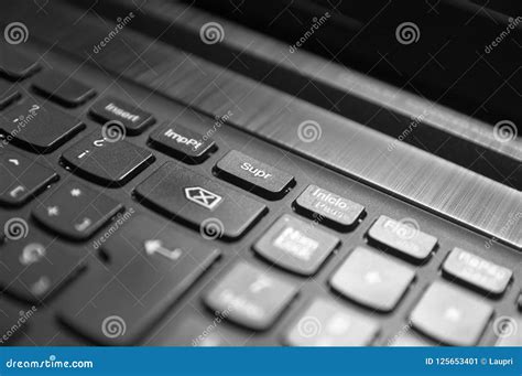 Delete And Rewind Buttons Of A Black Computer Keyboard Stock Image