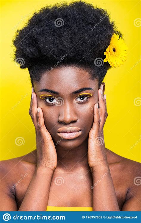 Serious African American Girl With Flower Looking At Camera Stock Image Image Of Serious