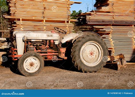 Ford N Series Tractor By A Sawmill Editorial Photography Image Of