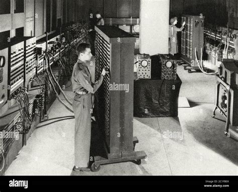 Man Next To Huge Eniac Computer Wcords By Bettmann