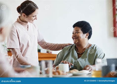Caring Young Woman Working In Nursing Home Stock Image Image Of Table