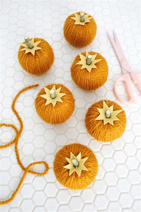 Yarn Pumpkin Garland Diy A Beautiful Mess Bloglovin