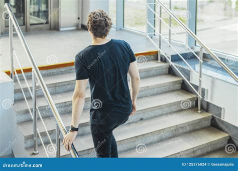 Young Man Climbing Up The Stairs At Metro Station Stock Photo Image