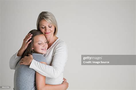 Mother And Daughter Hugging Photo Getty Images
