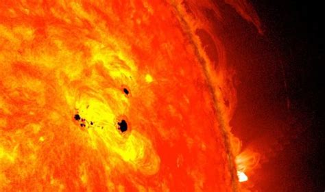 Two Sunspots Open On The Sun Which Could Combine To Create Strong Solar