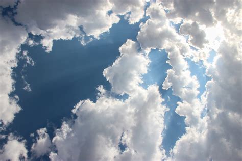 Free Stock Photo Of Sun Shining Through Clouds In Sky