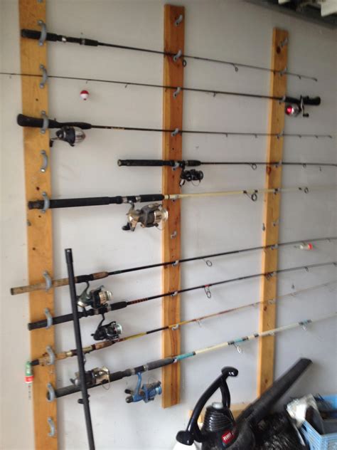 The total cost for this project was approximately $15. How to hang the fishing rods #fishingrodstoragediy #fishingrodrack | Diy fishing rod holder ...