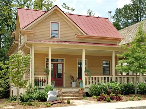 Farmhouse Style Home With Red Roof And Wraparound Porch Red Roof