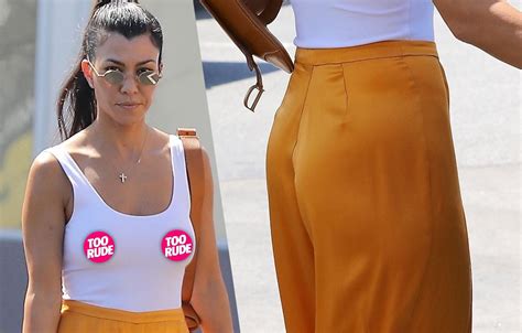 Kourtney Kardashian Goes Braless Yellow Pants