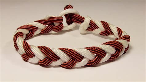 Double core bracelet setup with a single working end; "How You Can Make A 2 Color Four Strand Herringbone Braid Paracord Bracelet" - YouTube