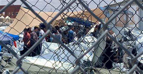 Migrants Being Held Outdoors Near Bridge In El Paso Official Says
