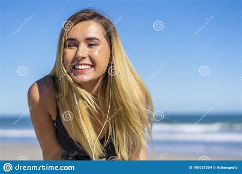 Beautiful Bikini Model Posing In A Beach Environment Stock Photo