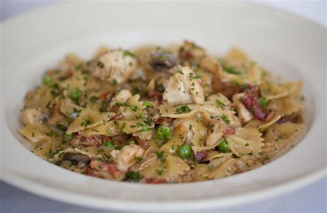 Farfalle with chicken and roasted garlic. Farfalle with Chicken and Roasted Garlic: Bow-tie pasta ...