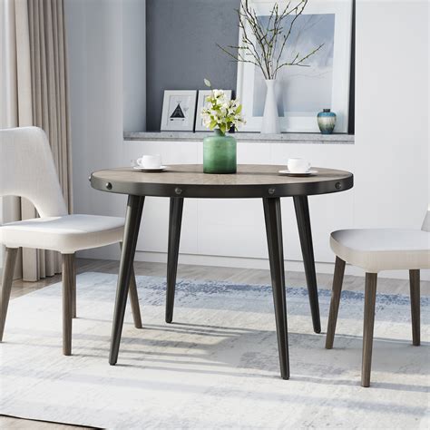 The legs are made from elm. Madalynn Round Dining Table with Elm Veneer Top, Weathered ...