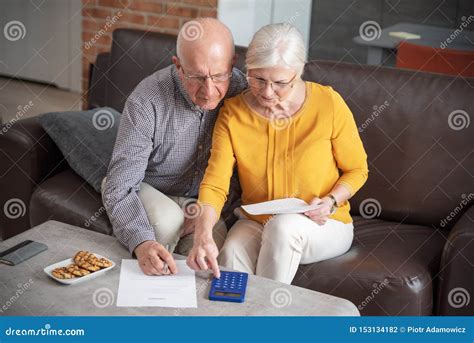 Senior Couple Paying Bills Together Stock Photo Image Of Finance