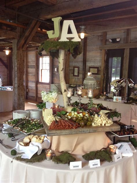 If you decide to take engagement photos and you know you are throwing a rustic wedding — why not incorporate the theme into the shots? Try This 50 Great Ideas for Rustic Food Display | Rustic wedding foods, Rustic food display, Diy ...
