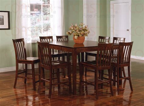 If you've been looking to upgrade your dining area to counter height, look no further than the. 9 Piece Counter Height Table Set in Rich Walnut Finish by ...