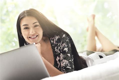 Woman Lying On Bed And Connecting With Her Laptop Stock Image Image Of Enjoying Communication